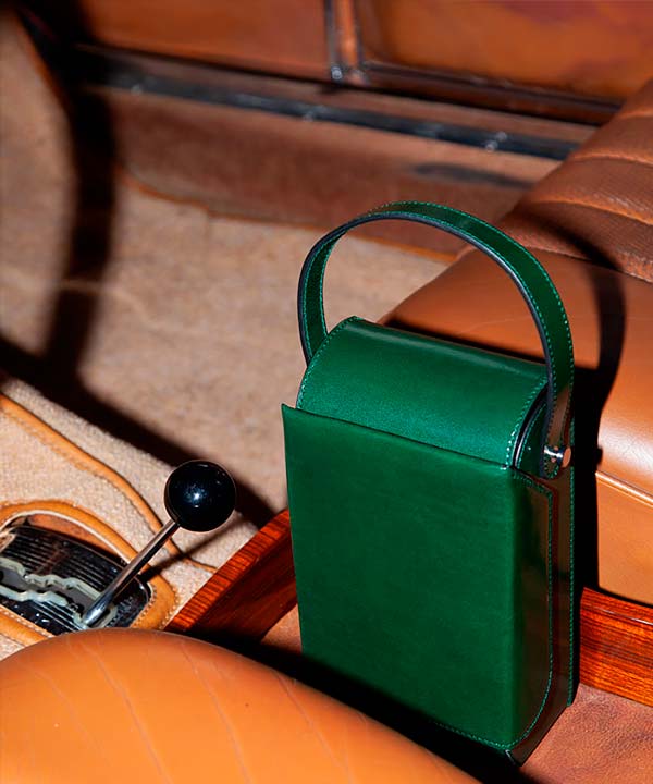Merryl Tielman | shiny dark green Frank crossbody bag