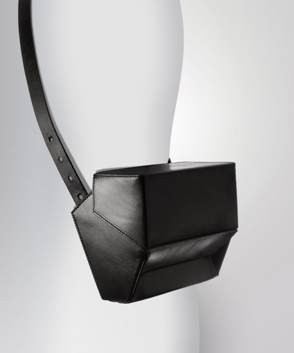 Merryl Tielman, Debby bag: a faceted shape that can be worn as a crossbody or belt bag. Made in Italy, vegetable tanned cow leather, colour black.