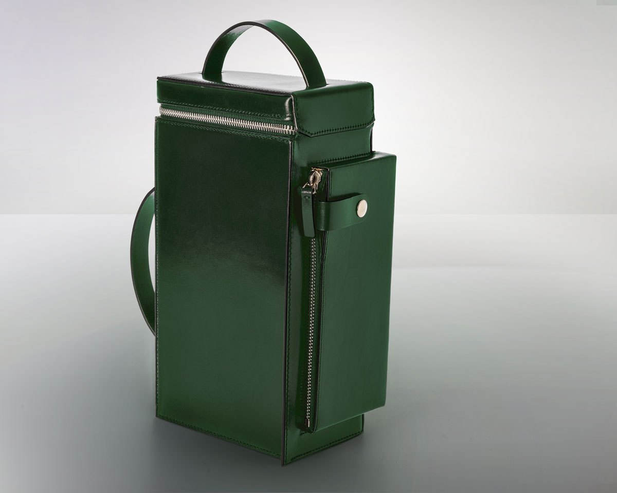 Merryl Tielman, Fabiola bag: a versatile asymmetrical hand/shoulder bag, that can be worn both vertically and horizontally. Made in Italy, vegetable tanned cow leather, colour dark green.