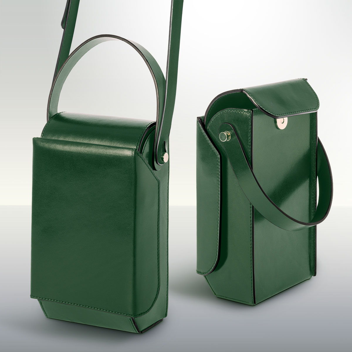 Merryl Tielman, Frank bag: an elegantly sized, rigid crossbody/hand bag with a 'flip open' front compartment. Made in Italy, vegetable tanned cow leather, colour dark green.